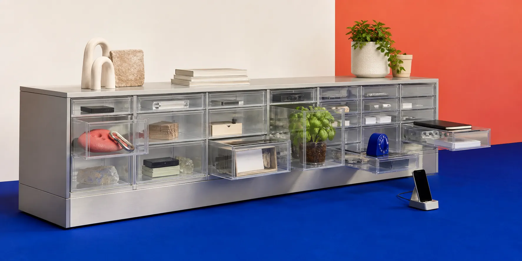 A physical archive cabinet holding miniature personal app worlds